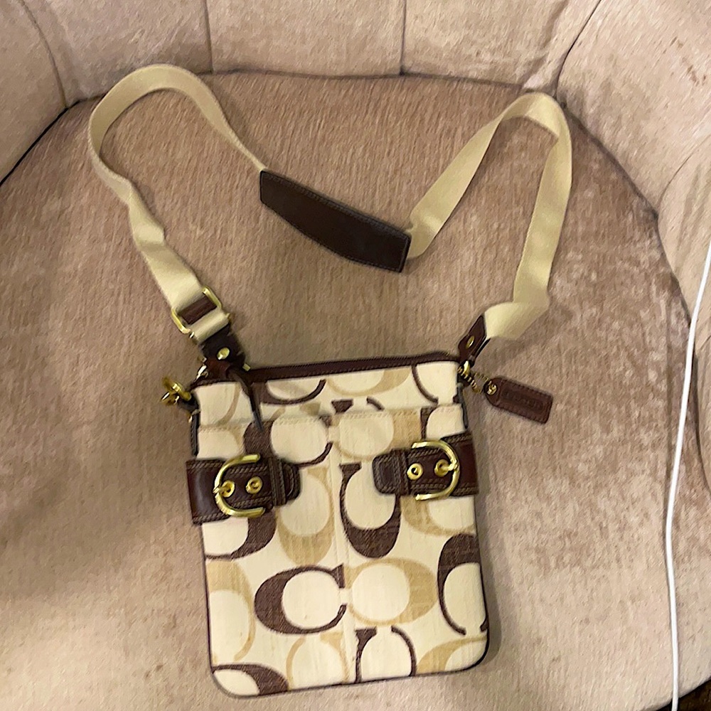 Never worn authentic coach crossbody bag.